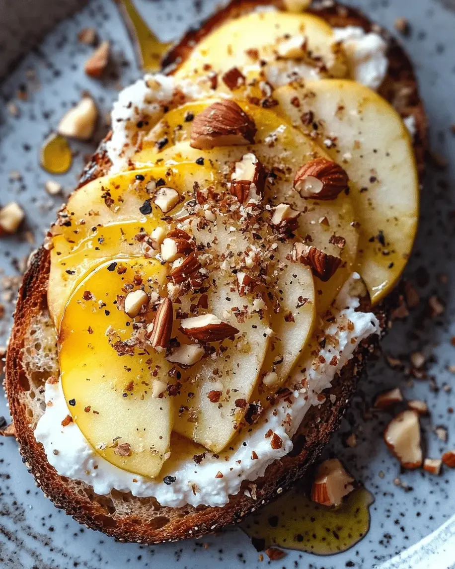 A vibrant close-up of sliced apples drizzled with honey, ready for the Honeyed Apple & Burrata Toast