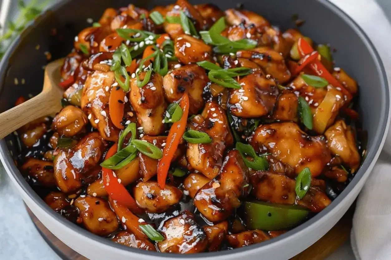 Crispy garlic chicken pieces coated in sauce