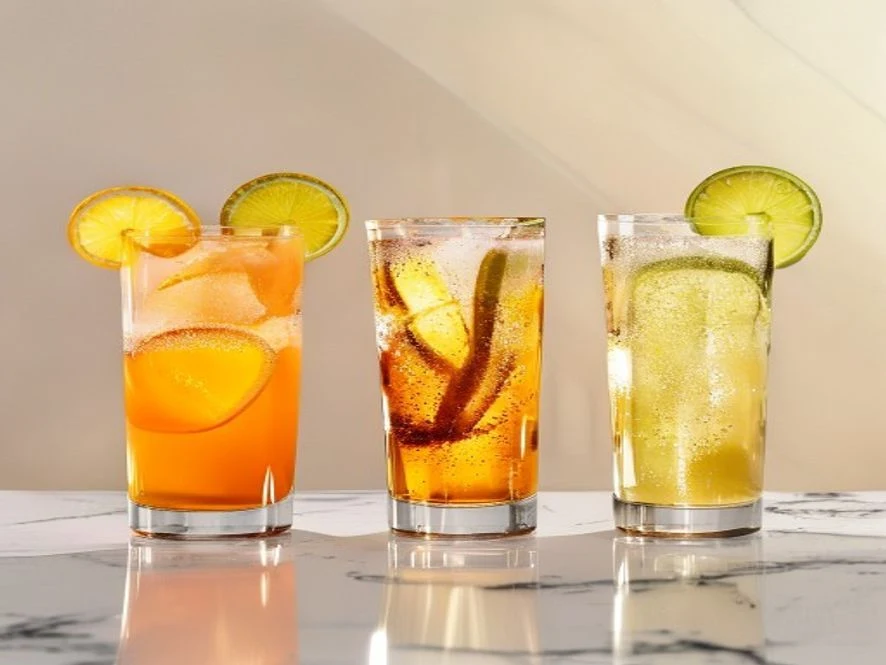 Three variations of cortisol balancing mocktail side by side: morning iced, evening warm and sparkling versions