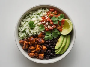 Chipotle honey chicken bowl with cilantro lime rice, black beans, salsa, and avocado